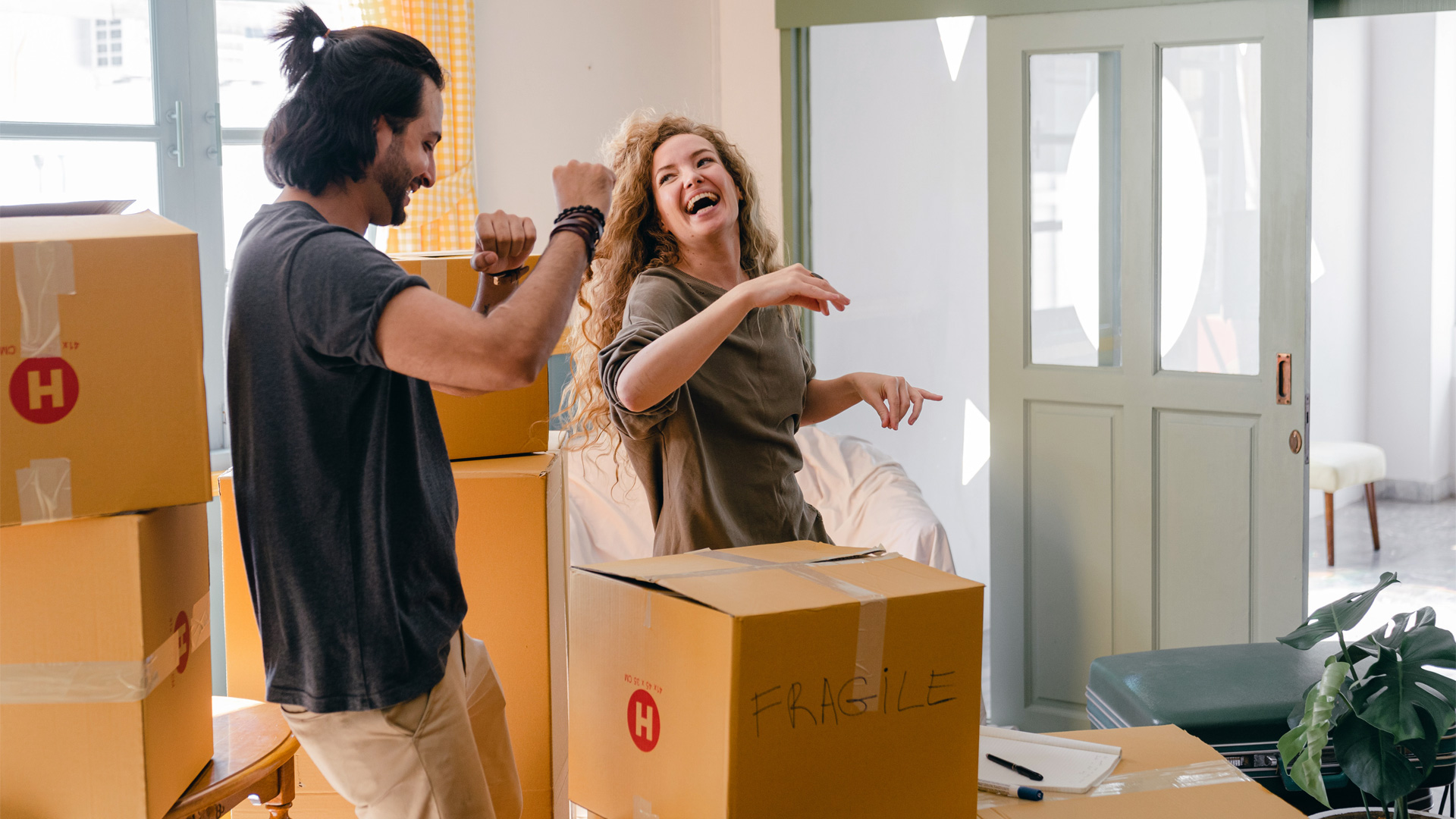 Photo of Couple Moving Home Photo of Couple Moving Home